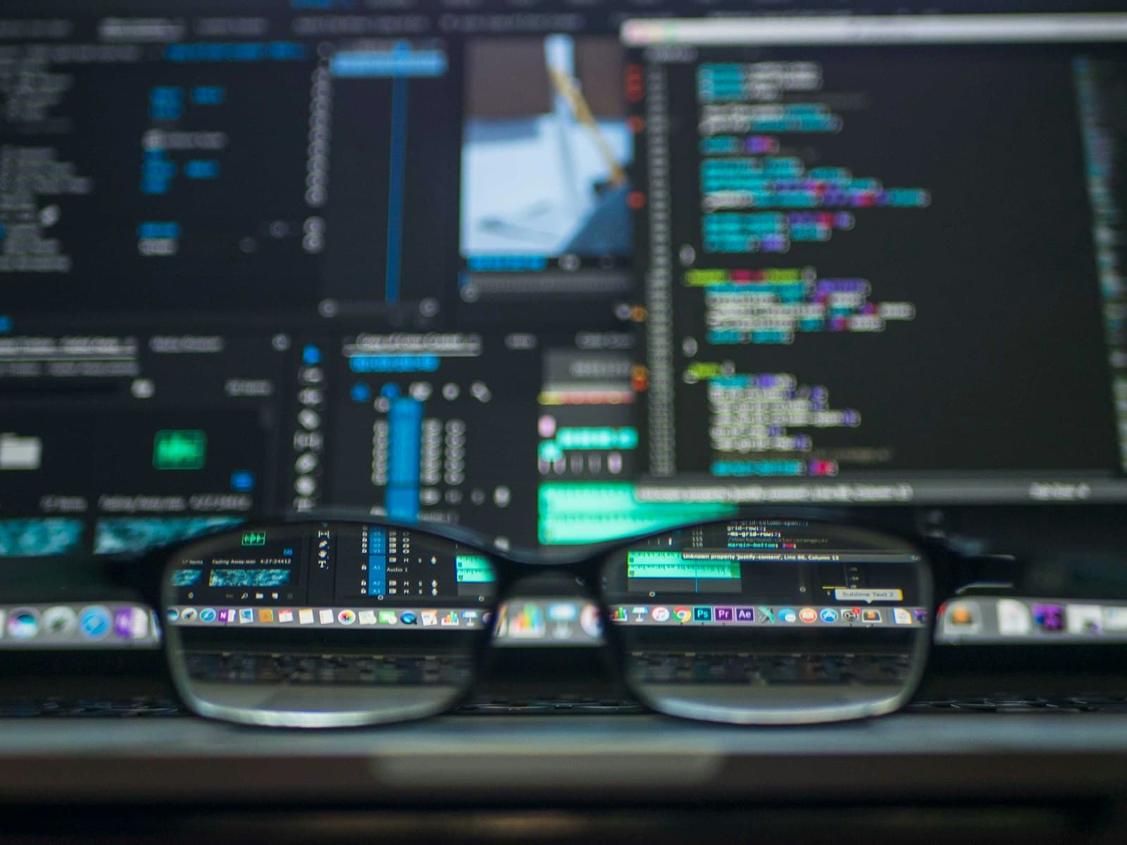 Security analyst reviewing code while investigating threats